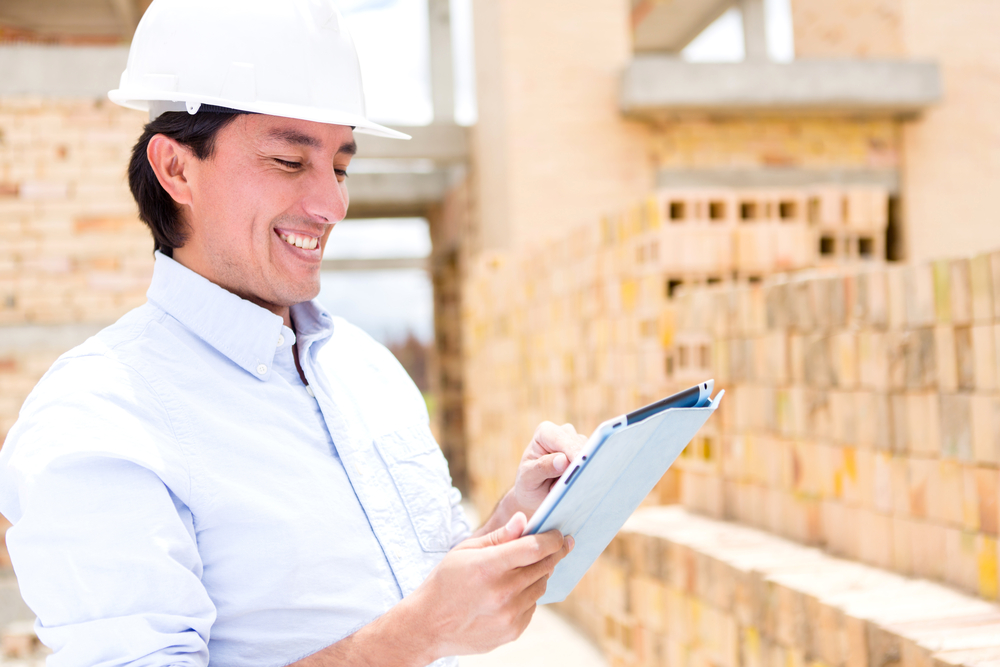 Civil engineer working with a tablet computer